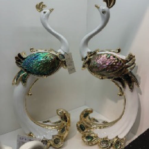 Peacock in pair with Ormer Shell